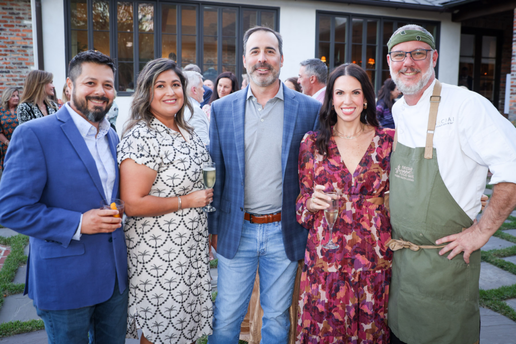 Guests and a chef at Harvest at Home Acadiana